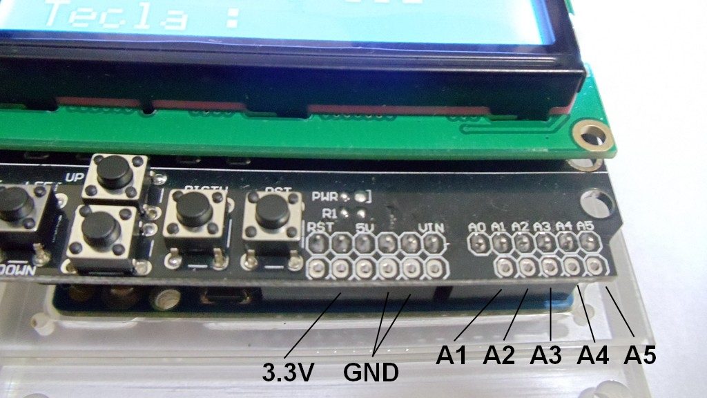 Detalhe portas analogicas e energia shield keypad